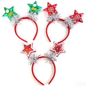 Close-up of Christmas star headbands with glitter tinsel and festive holiday patterns