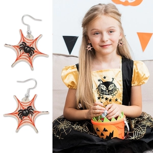 Halloween glitter spider web earrings featuring black spider design and girl wearing them