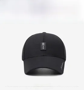 Detail of black cotton baseball cap with narason silicone logo and printed brim
