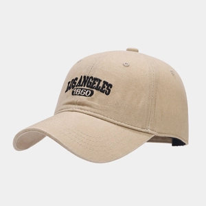 Vintage beige cotton baseball cap with Los Angeles 1850 embroidery on a white background