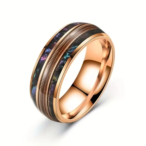 Rose gold tungsten ring featuring blue purple opal inlay and golden guitar string