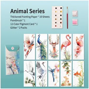 Flat lay of watercolor bookmark set with 10 animal patterns, paints, brush and glitter packs