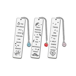 Three stainless steel teacher appreciation bookmarks with charms and engraved quotes