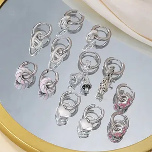 French style black and white geometric hoop earrings in a variety of artistic shapes