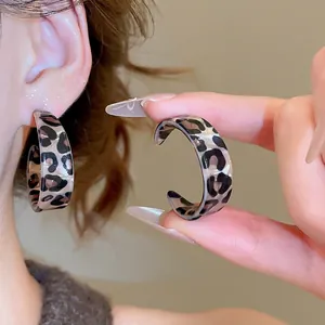Vintage leopard print acrylic C-shaped earrings with a retro resin aesthetic design