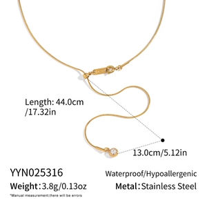 Detail of adjustable gold stainless steel snake chain showing its smooth metallic texture