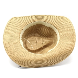Detailed inner view of straw hat showing spiral weave texture and white sweatband