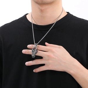 Men's silver punk dragon head pendant necklace with twisted chain on model