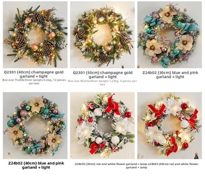 Detail view of various Christmas wreaths with LED lights in champagne, blue, and red colors