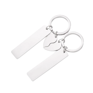 Polished stainless steel couple keychain set with interlocking heart and bar pendants
