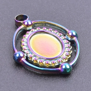 Macro view of rainbow stainless steel rotating frame pendant with oval base tray