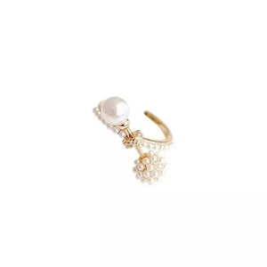 Elegant gold finish open ring featuring white pearl clusters and intricate beadwork inlay