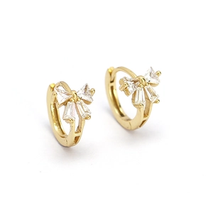 Elegant gold bow hoop earrings with sparkling clear cubic zirconia stones on white background