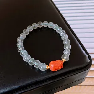 S925 silver beaded bracelet with translucent green gemstone and red carved Pixiu charm