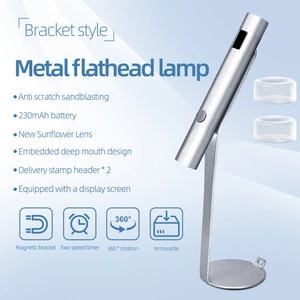 Detail of metal nail lamp with 230mAh battery, sunflower lens and two silicone stamper heads