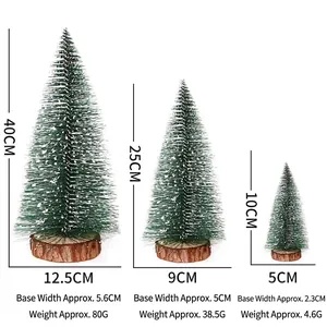 Three sizes of mini frosted pine Christmas trees with wooden bases for tabletop decor