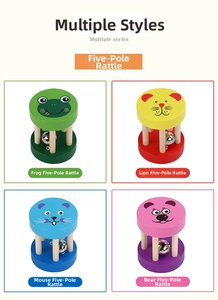 Detail of colorful wooden animal bells for children featuring frog lion mouse and bear styles