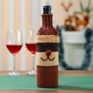 Detail of knitted reindeer wine bottle cover with 3D ears and nose for Christmas decor