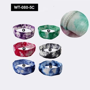 Detail of six tie-dye yoga headbands showing high-elasticity knit texture and edge stitching