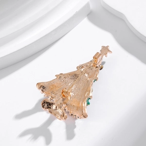 Golden Christmas tree brooch with green oil drip and rhinestones showing back clasp view
