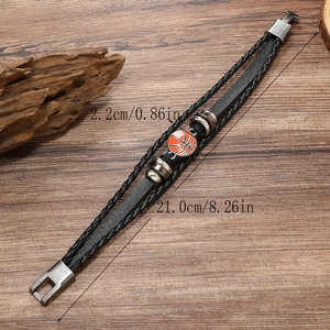 Detailed view showing a 21cm multilayer leather bracelet with a 2.2cm orange basketball charm