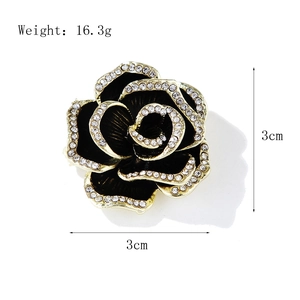 Spilla a camelia in smalto nero e strass dorati, dimensioni 3cm x 3cm, 16,3g