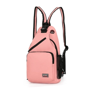 Pink oxford crossbody bag detail with sports label and durable nylon texture macro