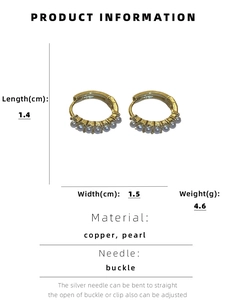 Detailed view of small golden hoop earrings with pearls and sizing information