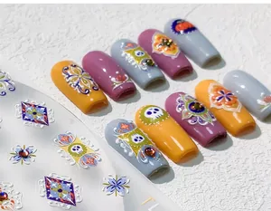 3D relief nail stickers featuring colorful Day of the Dead skulls and floral patterns