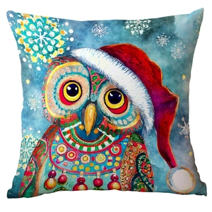 Christmas cushion cover with watercolor owl design and Santa hat on blue background