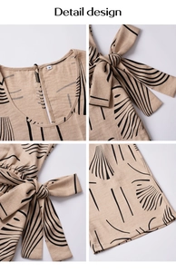 Detail design of a beige printed jumpsuit with bow tie accents and abstract pattern