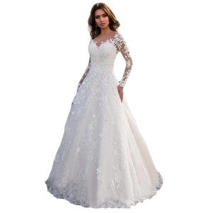 Elegant long-sleeved white lace wedding dress with deep V-neck and floral embroidery