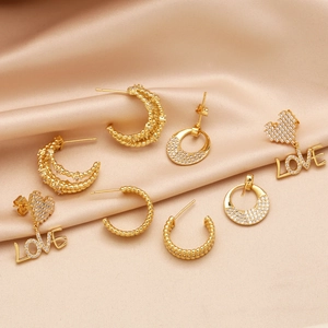 Fashion gold C-shape earrings set with sparkling LOVE heart pendants and crystal studs