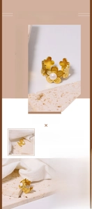 Close-up of golden flower ring crafted in titanium steel with a freshwater pearl detail