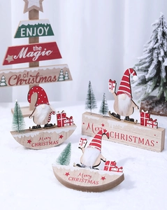 Close-up of Nordic Christmas gnome wood decor set with plush beards and skating themes