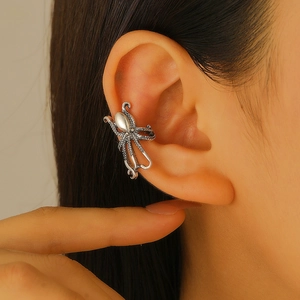Vintage silver octopus ear cuff with intricate tentacles for non-pierced ears