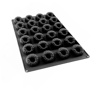Macro view of 24-cavity black silicone mold for Canelé cakes and chocolate baking