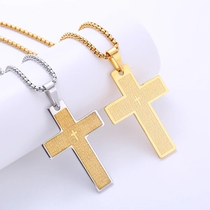 Retro stainless steel cross pendant necklace with engraved Spanish scripture detail
