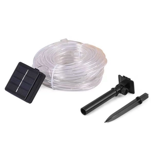 Detailed view of solar outdoor LED tube lights with solar panel and garden ground stake