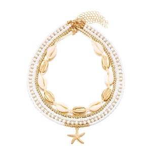 Bohemian multi-layer necklace with white beads, golden starfish and natural seashell charms