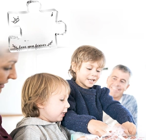 Clear acrylic puzzle ornament with sentimental message for brothers in a home setting