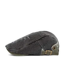 Vue latérale détaillée du béret en denim gris foncé vieilli avec boucle en cuivre rétro