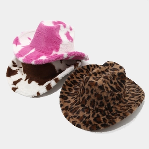 Plush western cowboy hats in leopard and cow prints for winter fashion styling
