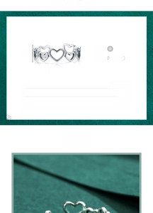 Macro detail of s925 sterling silver hollow heart ring with 5.5mm band width