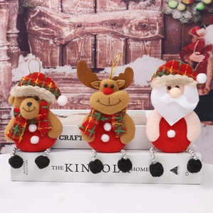 Three plush Christmas ornaments featuring Santa, reindeer, and bear for tree decoration