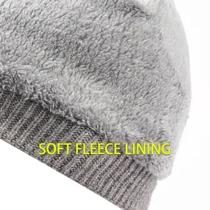Grey winter knit beanie with warm fleece lining and S-label visor for men