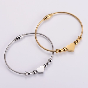 Elegant stainless steel cable wire bracelet with heart pendant in gold and silver finish
