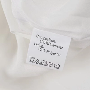 Detail view of clothing care label showing 100% polyester material and washing symbols