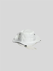 Detail of white boonie hat featuring adjustable chin cord and metal ventilation eyelets