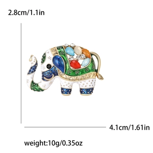 Vintage elephant brooch in gold alloy with colorful enamel, rhinestones and green gems